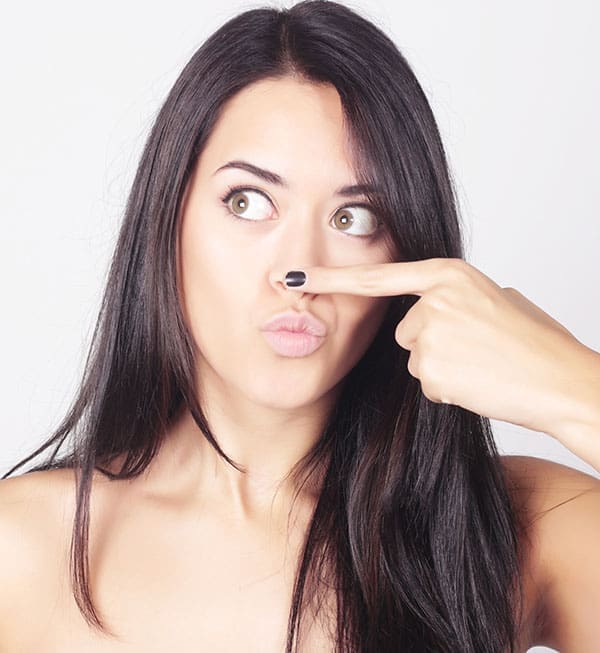 Beautiful young caucasian woman with funny face expression.